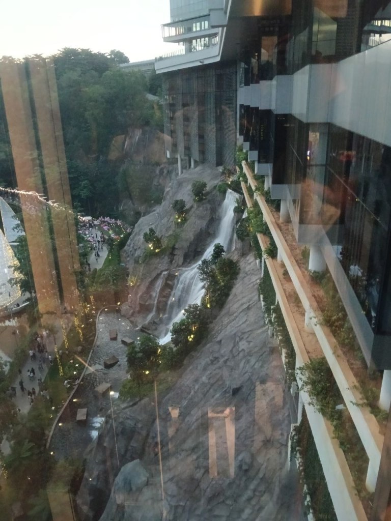 Stunning waterfall cascading down rocks outside Sunway Square Mall